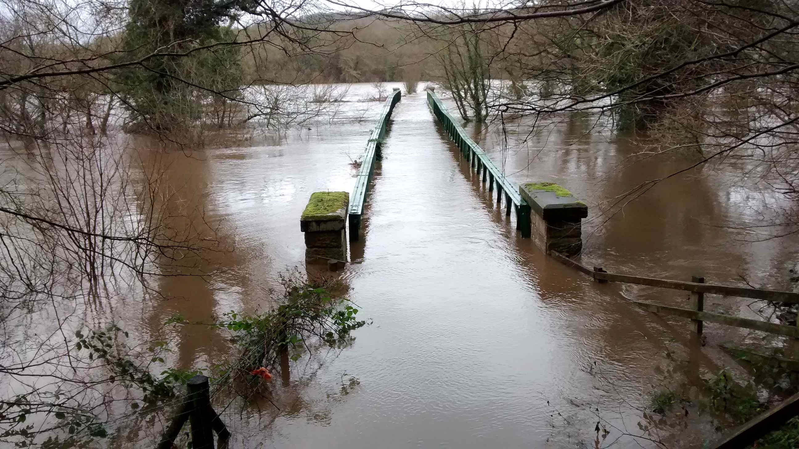 The river over the bridge! Shouldn't that be the bridge over the river?